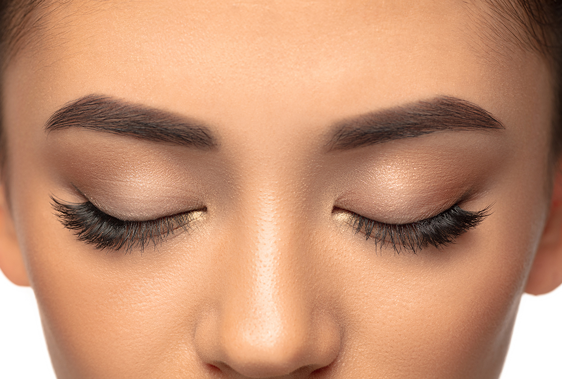 Close up portrait of beautiful jewish woman isolated on studio background.